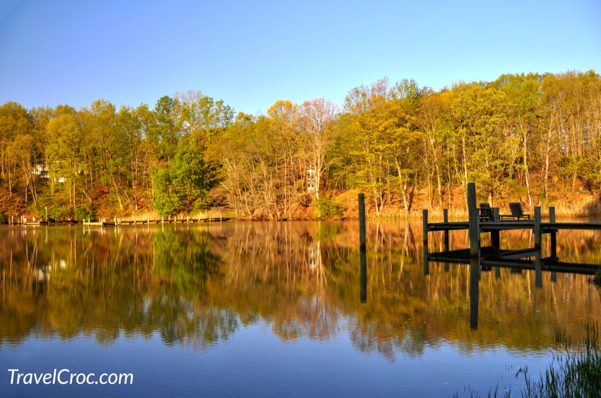 A colorful autumn shoreline in the still waters of the Mill Creek