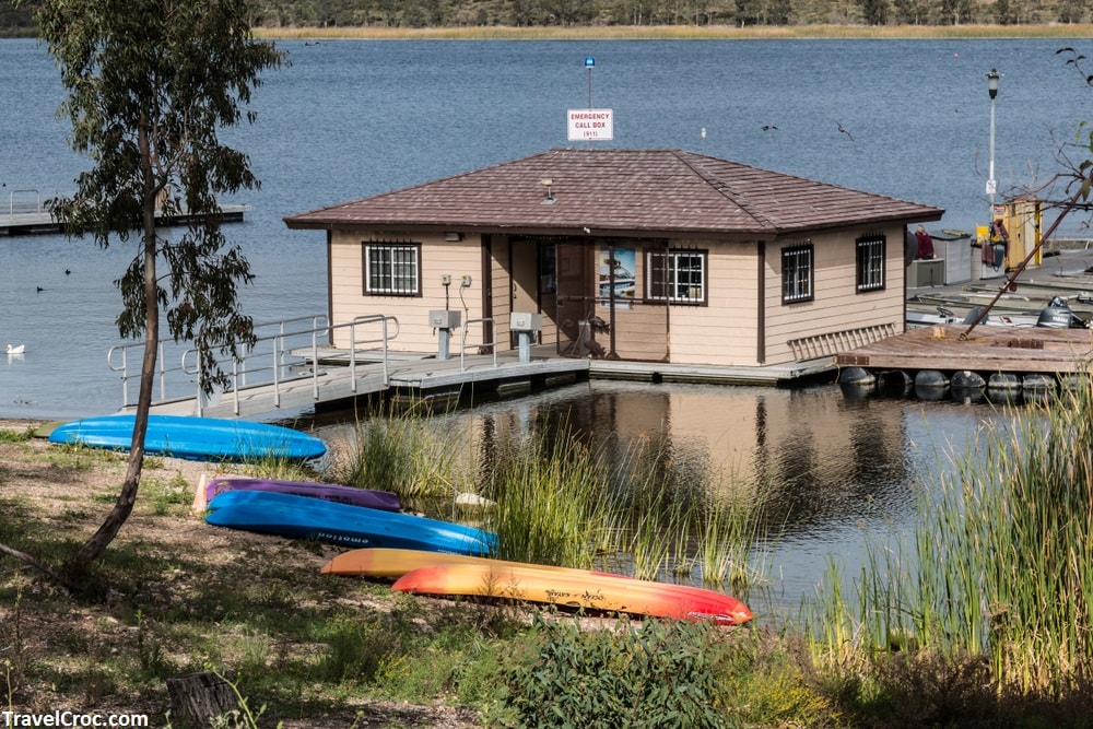 Rental kayaks rest outside the boat dock at Lower Otay Lake - Places to Kayak in San Diego