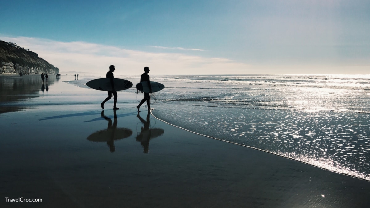 2 Surfers on the beach in San Diego