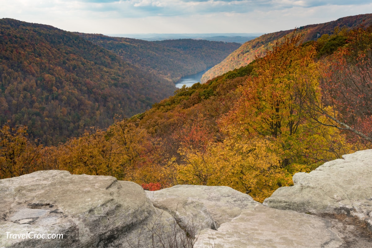 hikes in Norther VA, View of hills covered with fall trees from Raven Rock overlook at Coopers Rock State Forest