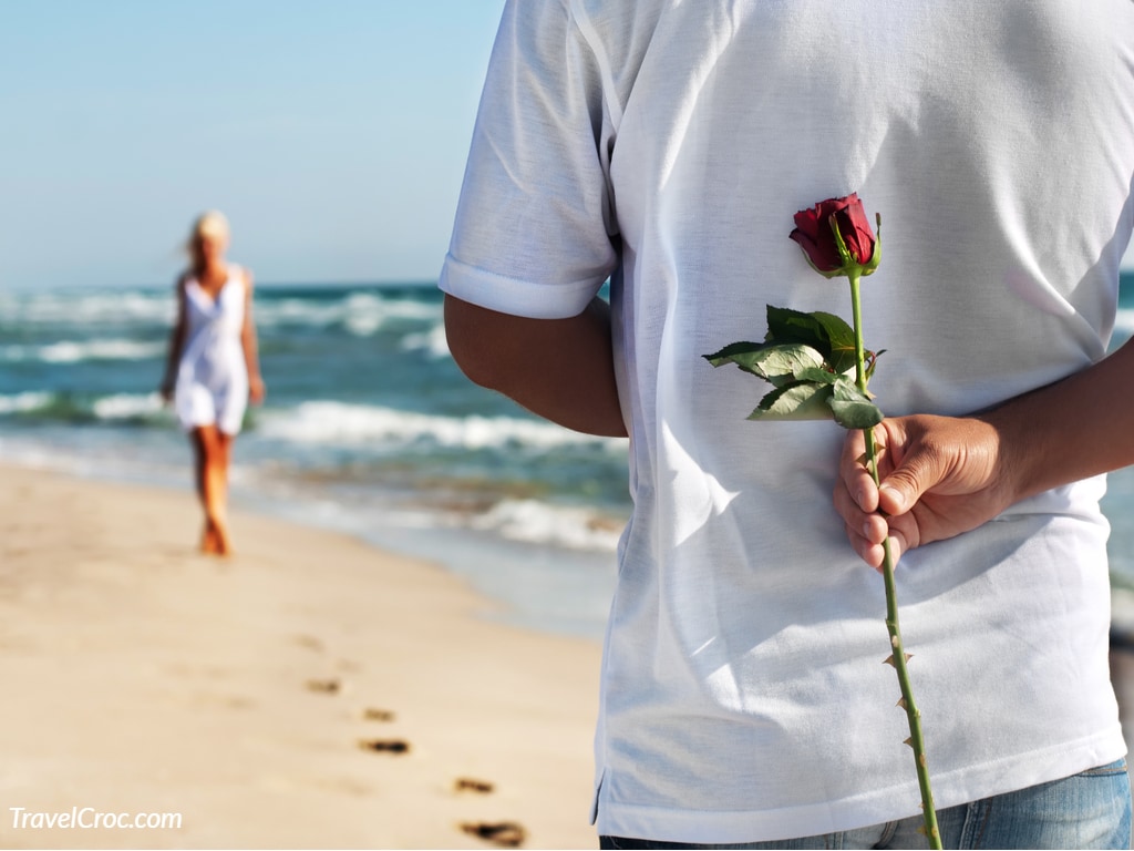 man with rose waiting his woman for romantic date