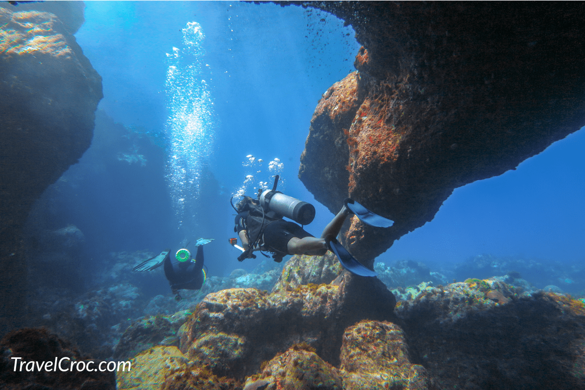 Two scuba divers in a cave in Puerto Rico