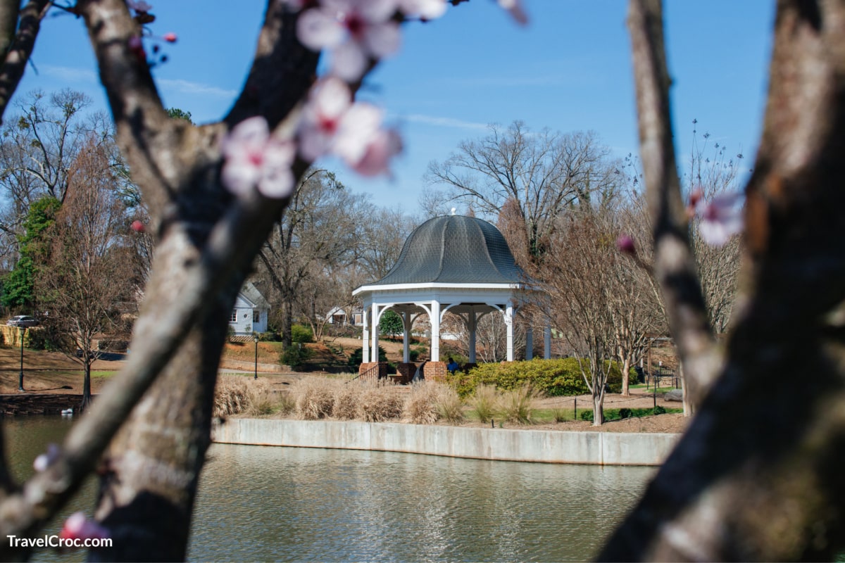 A beautiful park with a large pond and a beautiful gazebo among flowering trees. Things To Do in Spartanburg SC