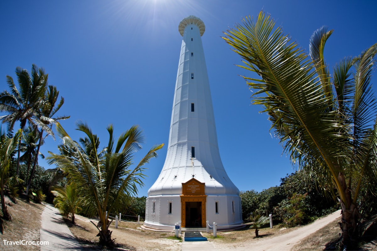A tall lighthouse is built on Amadee Island just off New Caledonia