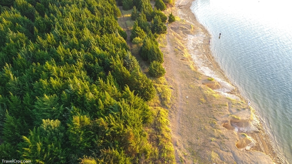 Aerial view sandy shore line with people bank fishing at Ticky Creek Park, Lake Lavon - Best Beaches in Dallas Texas