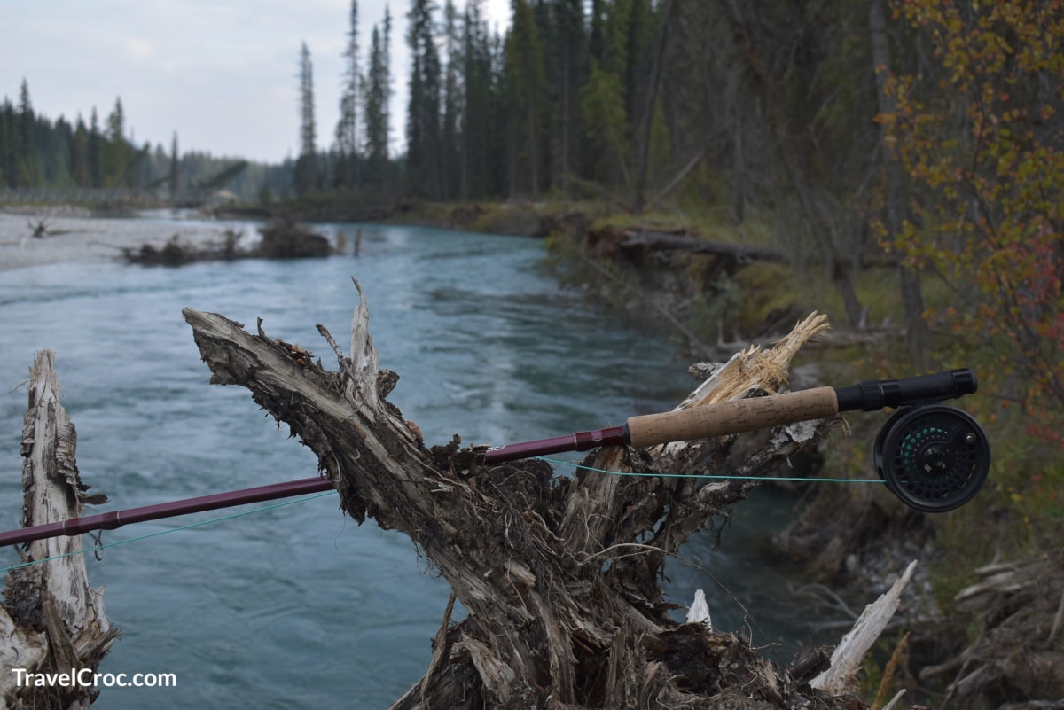 Fishing rod folded on a wood for fishing in Kootenay River,Canada.