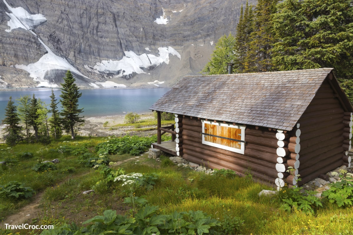 Heritage Landmark Log Cabin on a Green Alpine in Kootenay National Park Canadian Rockies