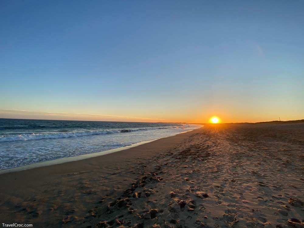 Ocean rolling in to Narragansett Town Beach at sunset. - Rhode Island Coastal Towns