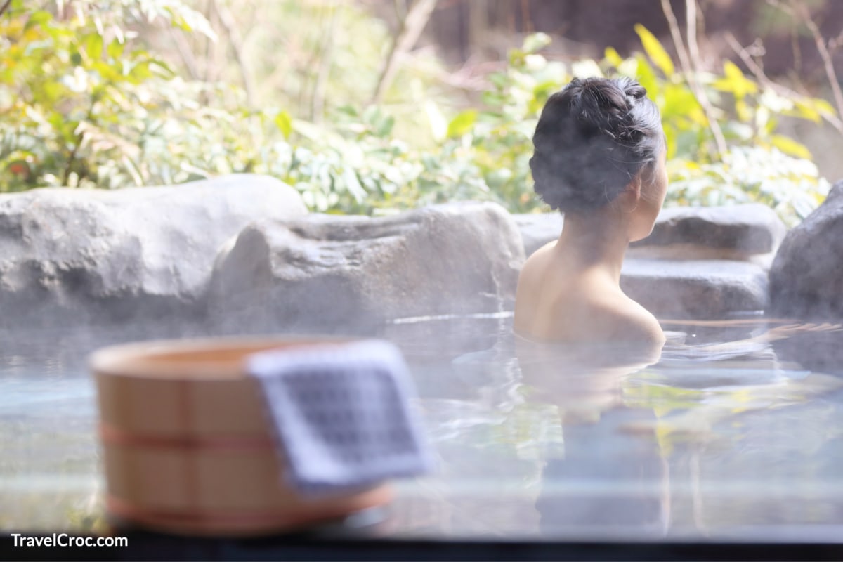Woman Relaxing in Hot springs in Kootenay National Park