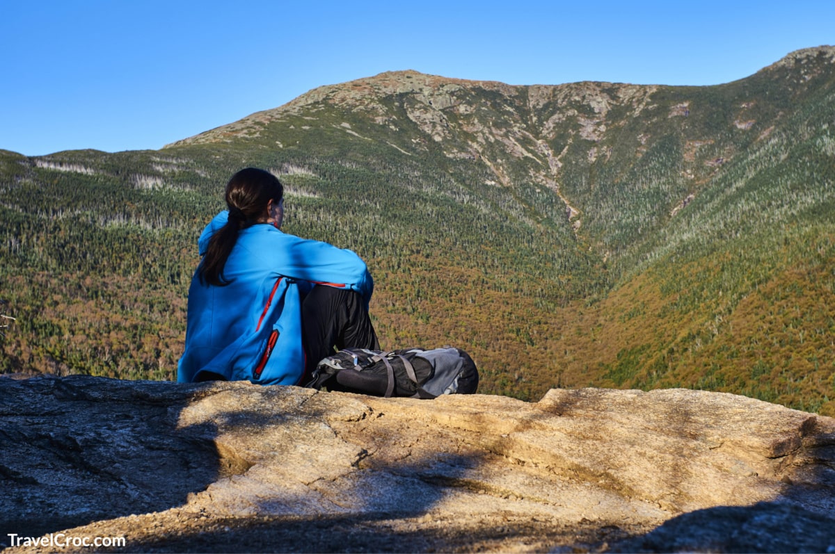 Woman viewing the white mountains in New Hampshire