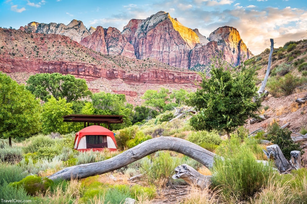 Zion National Park in Utah with tent camp site at Watchman Campground by rocks - Best time to visit Zion National Park For Camping