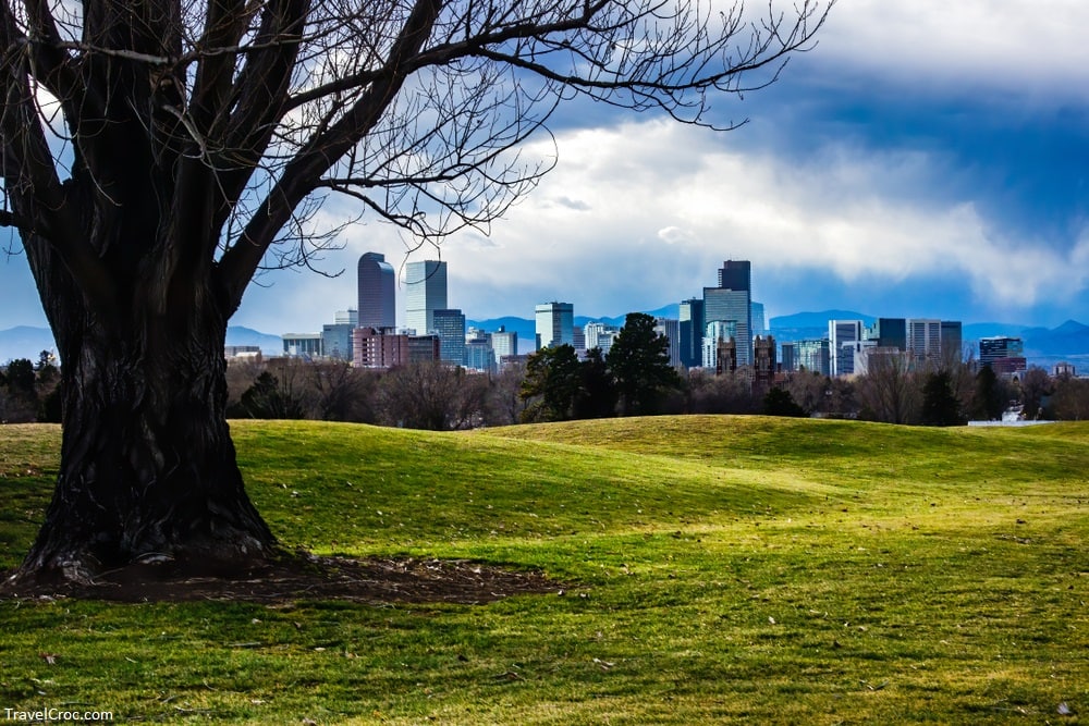 Clouds Gather over Denver Skyline in the Evening - Grassy Field - Denver Average Temperature by Month