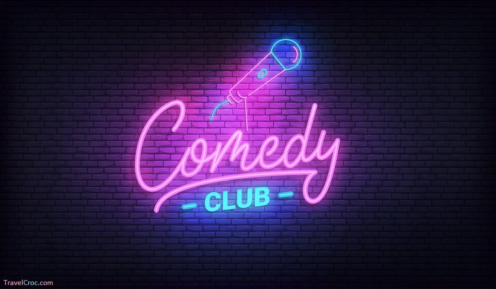 Things to do in Rocky Mount this weekend -Comedy night neon template. Comedy lettering and glowing neon microphone.