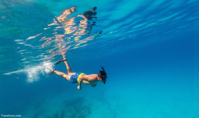 Underwater photo freediver swim in clear sea - Playa del Carmen Snorkeling Spots