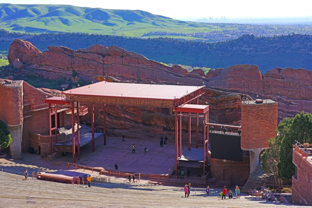 Places to visit in Denver - View of the Red Rocks Amphitheatre, an open-air amphitheater carved into the red rock located near Denver, Colorado.