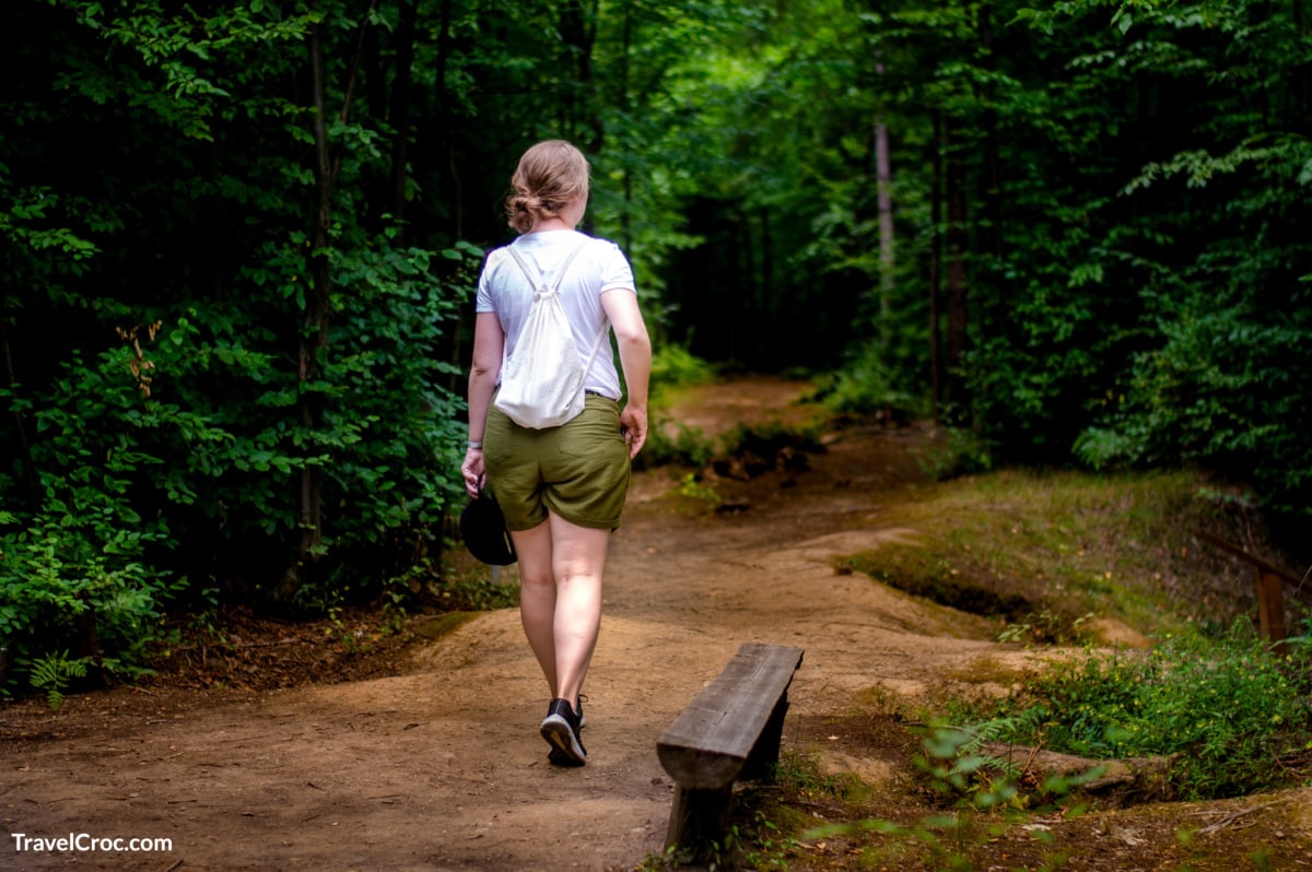 Woman Hiking in nature trail