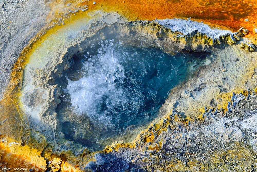 Closeup of a boiling geyser in Upper Geyser basin of Yellowstone National Park, Wyoming