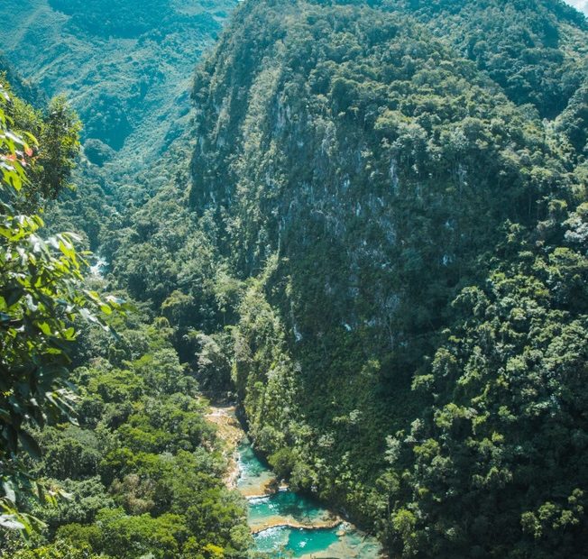 Aerial view of the beautiful, turquoise natural pools of Semuc Champey - Best Time To Visit Guatemala