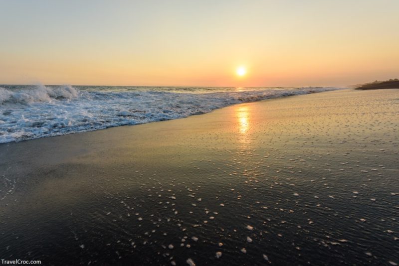 Sunset at Beach with Black Sand in Monterrico, Guatemala. Monterrico is situated on the Pacific coast in the department of Santa Rosa.