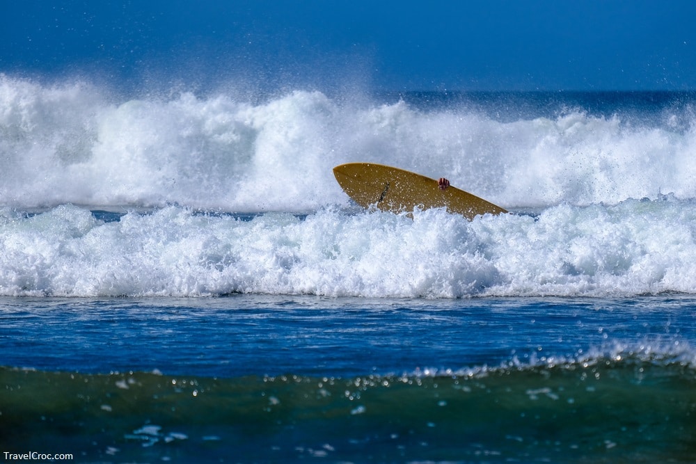 Surfing in Nicaragua - Surfer caught in waves in El Yankee Beach, Nicaragua