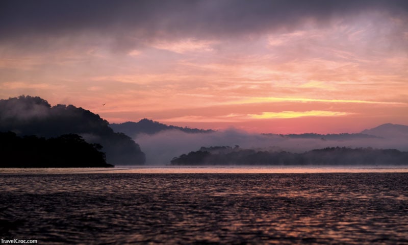 A beautiful sunrise sailing on the Rio Dulce, Guatemalas beautiful river famous for its nature and biodiversity