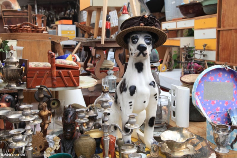 Flea Market Atlanta - Old vintage objects and furniture for sale at a flea market. Toy vintage dog.