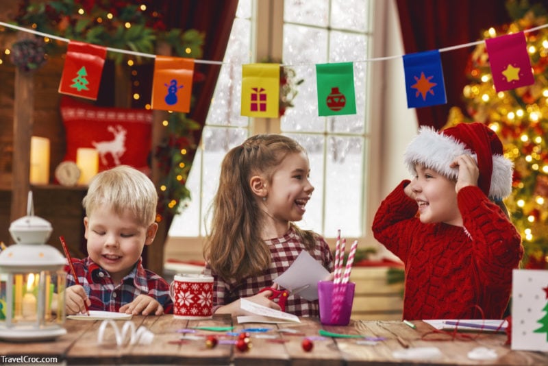 Merry Christmas and Happy Holidays. Adorable little children make cards, gifts and decorations for the holiday.-Things To Do in Payson AZ in December