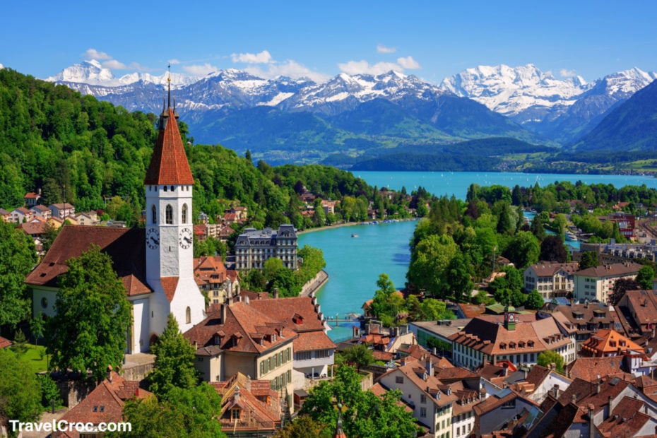 Thun city and lake Thun with snow covered Bernese Highlands swiss Alps
