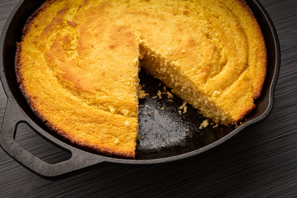 Fresh cornbread right out of the oven baked in a cast iron skillet