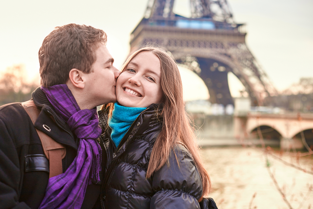 A couple spending Valentine's Day by the Eiffel Tower